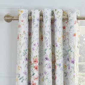 Dorma wildflower curtains  Patterned with flowers and foilage for a sophisticated print design this pair of curtains from Dorma are made from 100% cotton and crafted to offer a 300 thread count alongside a blackout lining, they are available in a choice of sizes